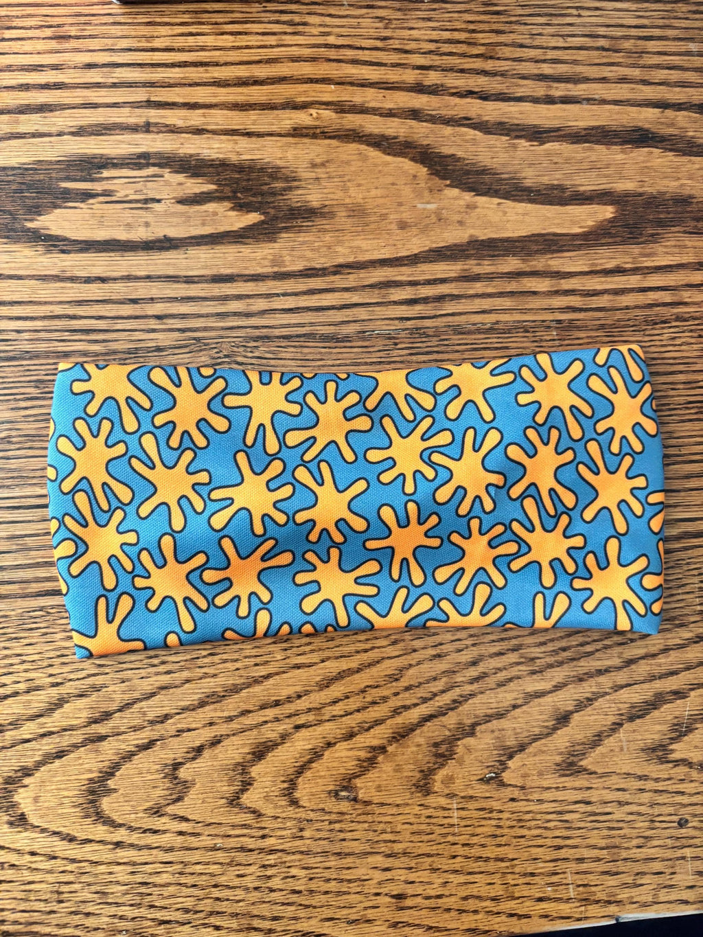Orange Splat Moisture Wicking, non slip, athletic headband. Womens workout headband. Running headband.