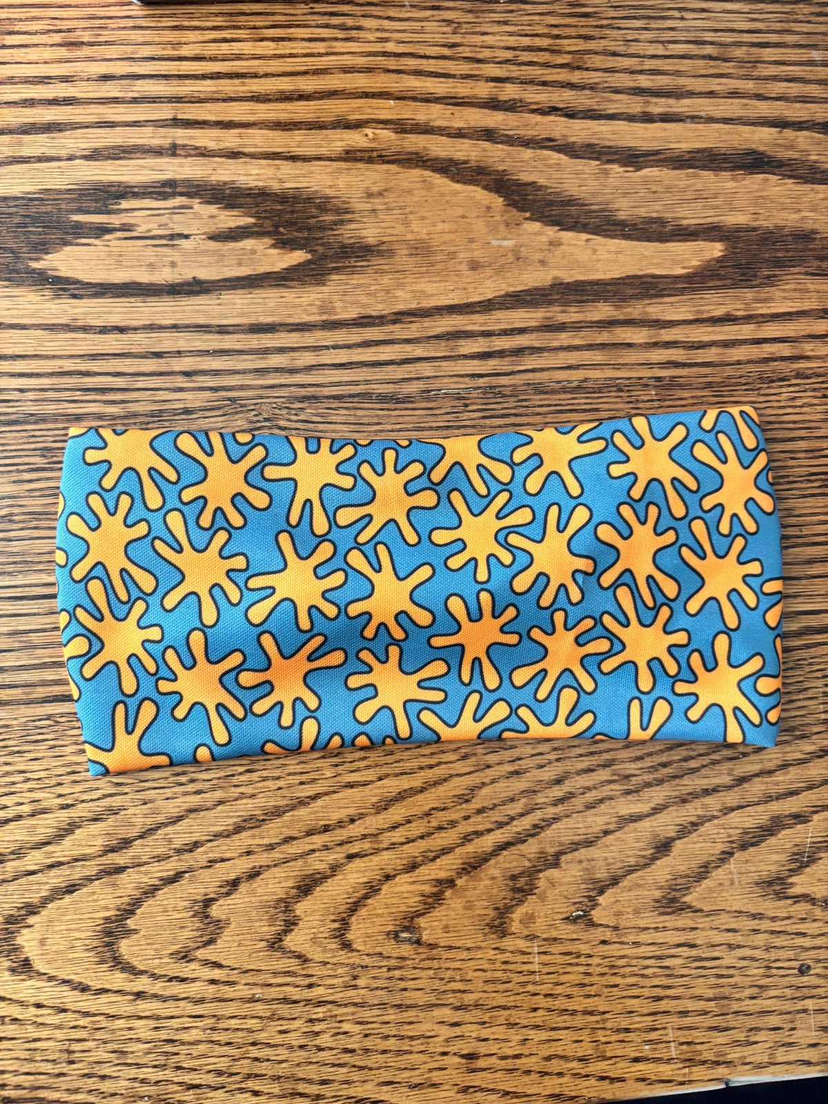 Orange Splat Moisture Wicking, non slip, athletic headband. Womens workout headband. Running headband.